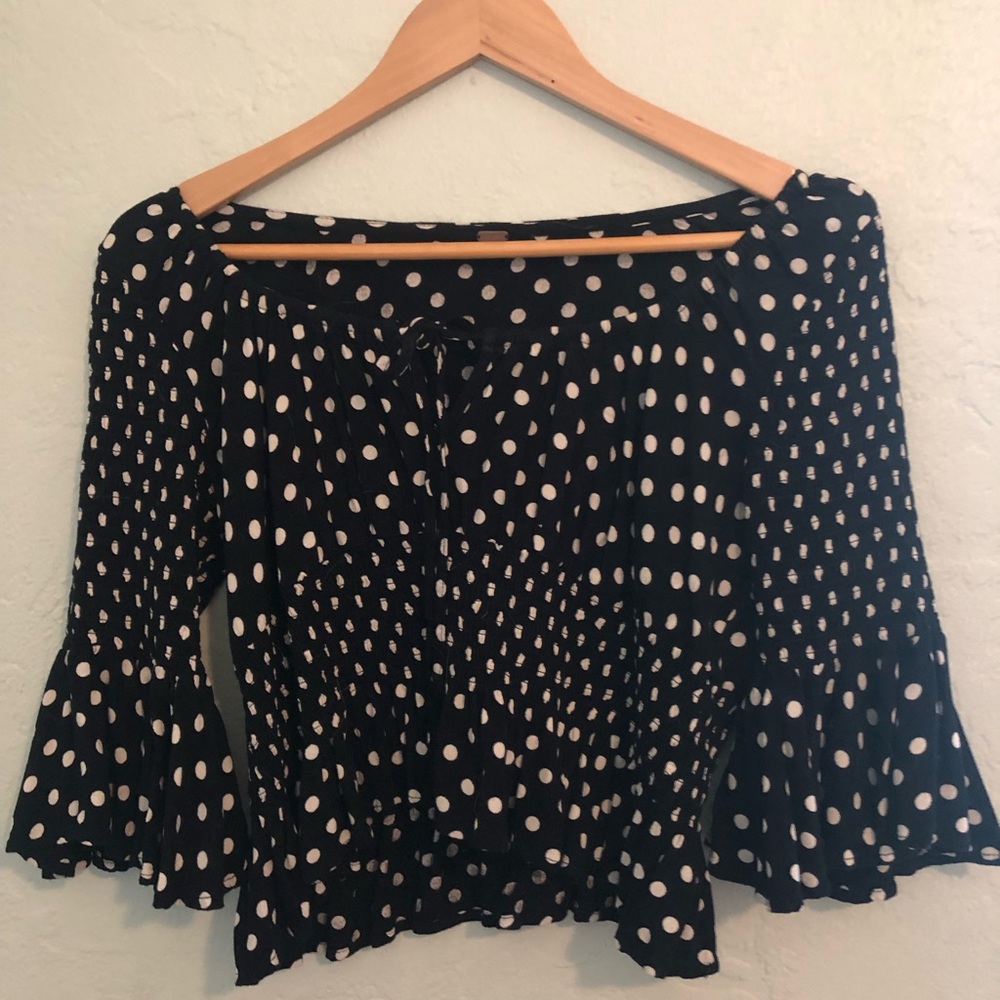 Polka dot Free People blouse with Y2K sleeves and peephole